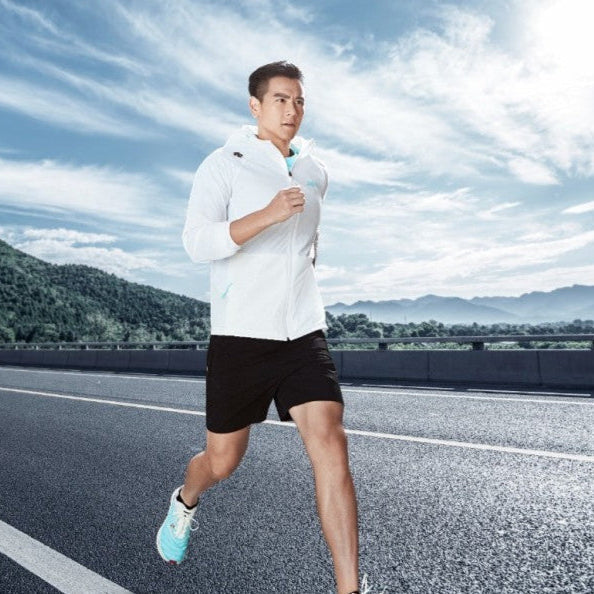 Eddie Peng working out, demonstrating strength, confidence, and dedication